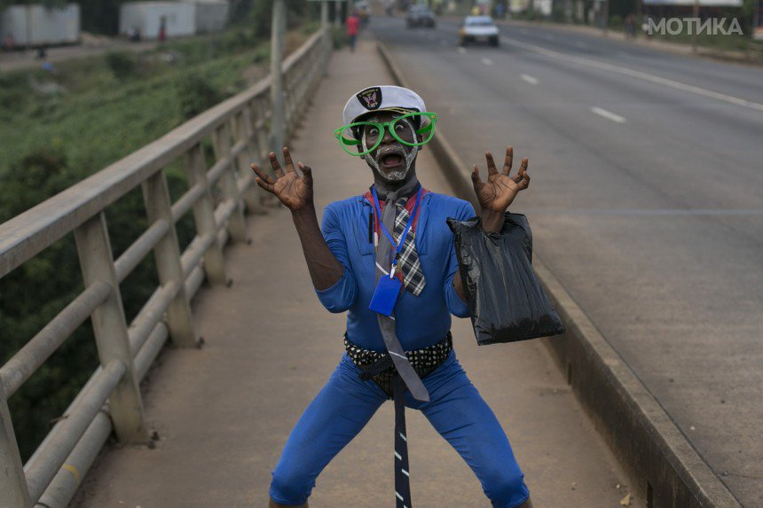 Sierra Leonean man poses on a street in Freetown