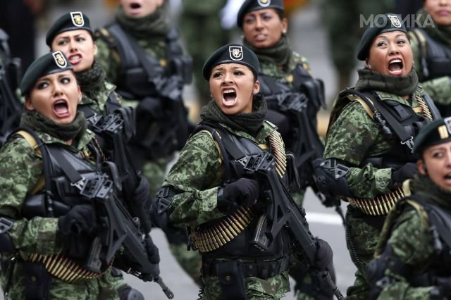 Soldiers participate in a military parade celebrating Independence Day at the Zocalo square in downtown Mexico City