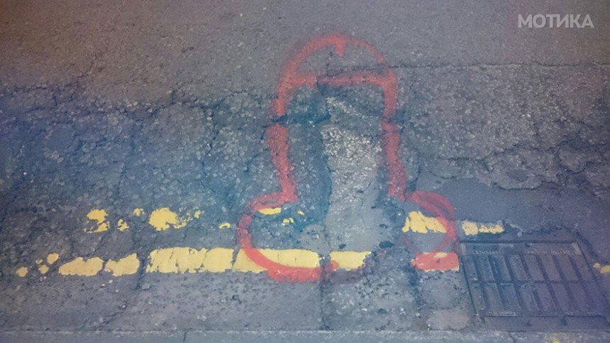 wanksy-penis-pothole-graffiti-manchester-england-3