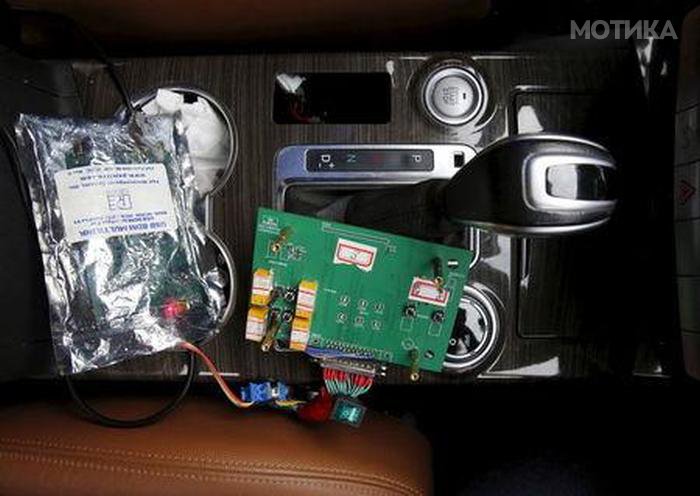 Part of devices of a brain-controlled vehicle system is seen connected to a car during a demonstration at Nankai University in Tianjin