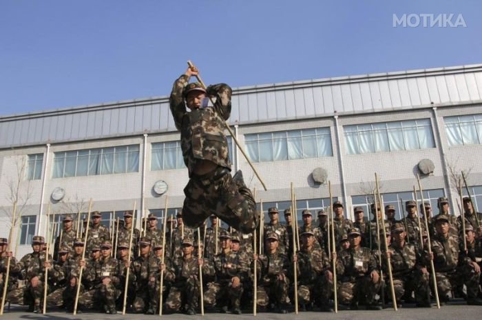 New recruit paramilitary policemen practice during a adaption drill in Hohhot